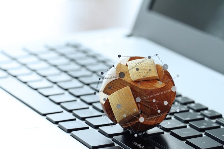 wooden texture globe with social media diagram on laptop computer as internet concept